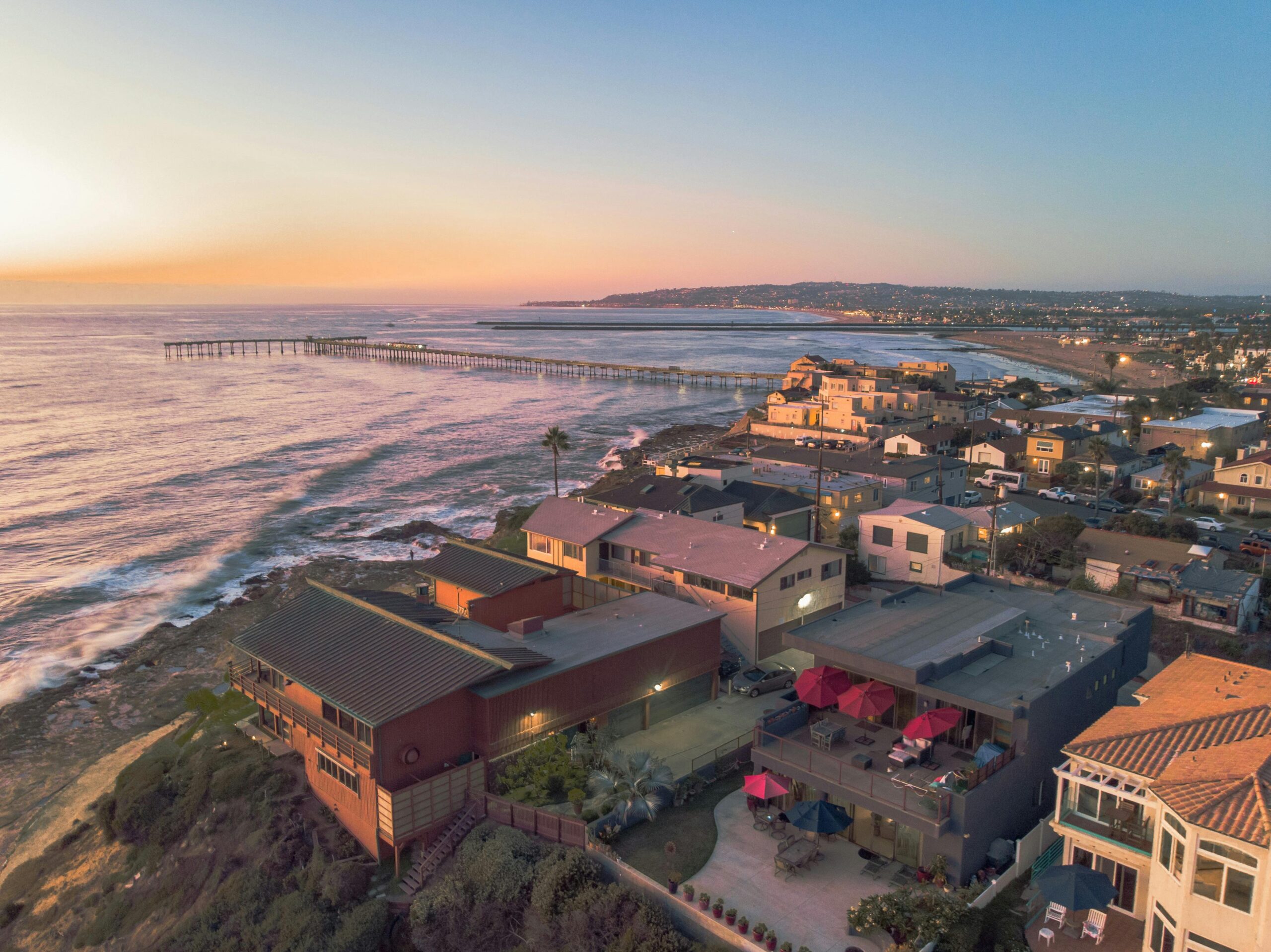 pexels-thom-gonzalez-3126166-13975969 Homes along San Diego coastline with view of ocean and pier